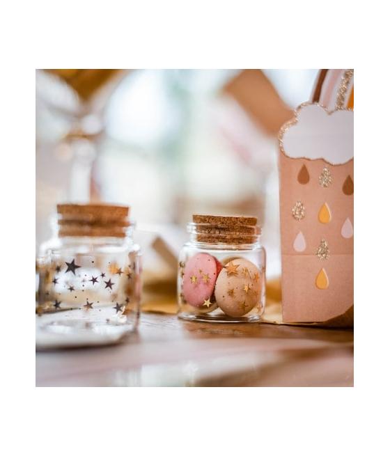 Fiole en verre avec petites étoiles