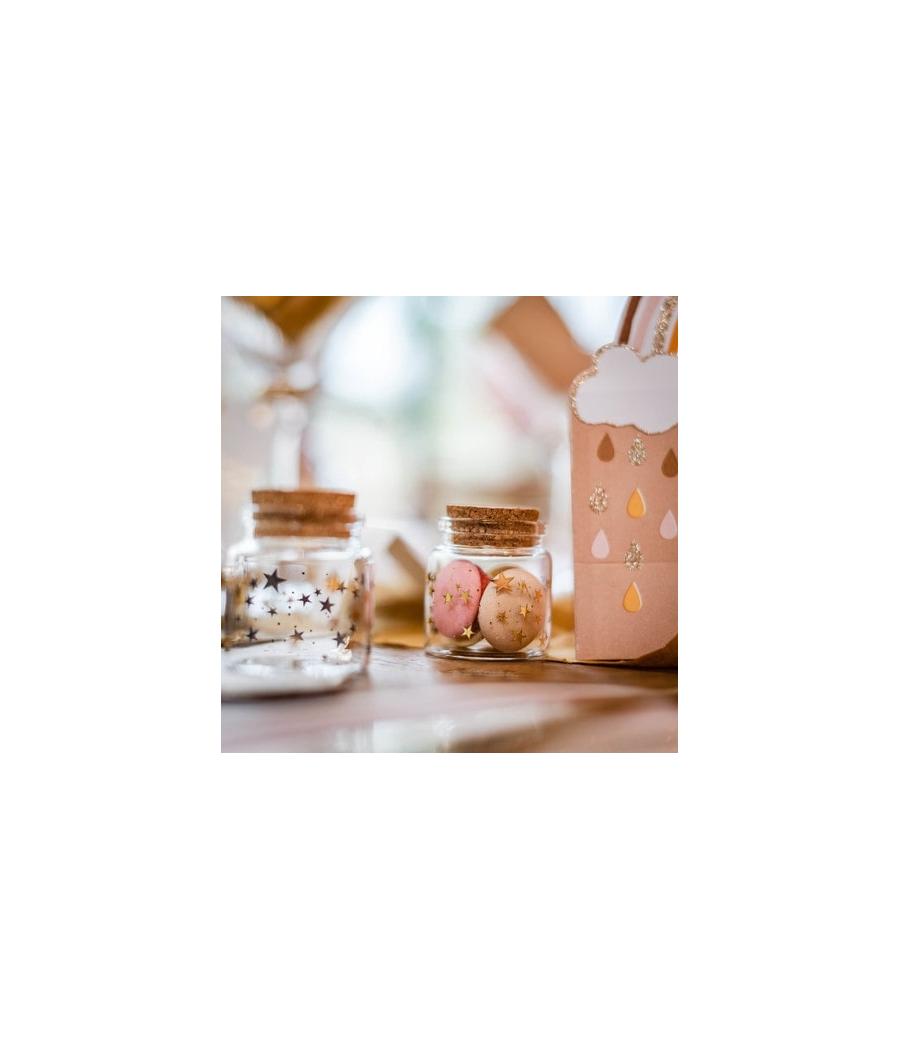 Fiole en verre avec petites étoiles