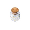 Fiole en verre avec petites étoiles