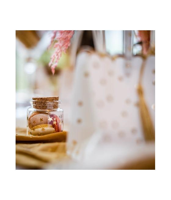 Fiole en verre avec petites étoiles